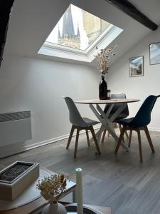 Appartements Le p'tit millesime - hypercentre : photos des chambres