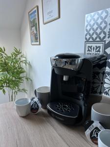 Appartements Le p'tit millesime - hypercentre : photos des chambres