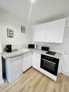 Appartements Les Hortensias : photos des chambres