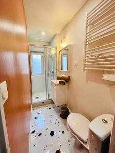 Appartements Les Hortensias : photos des chambres