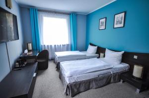 Deluxe Double Room room in Hotel Trzy Światy Spa & Wellness Rajska WySpa