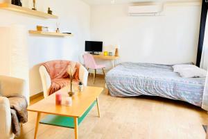 Appartements SECRET GARDEN parking hyper centre & calme : photos des chambres