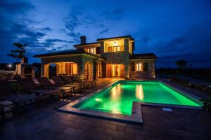 Romantic villa with a large pool and garden in a quiet area - by TRAVELER tourist agency Krk ID 2158