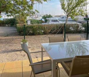 Face au bateaux, Neuf, 2 chambres , jardin