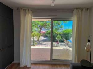 Face au bateaux, Neuf, 2 chambres , jardin