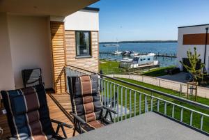 Hangar 19 Luxusapartment mit Sauna, Kamin und Seeblick H4W3
