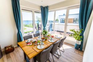 Hangar 19 Luxusapartment mit Sauna, Kamin und Seeblick H4W3