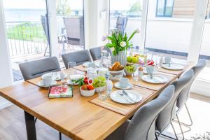 Hangar 19 Luxusapartment mit Sauna, Kamin und Seeblick H4W3