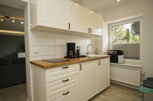 Ruhig und idyllische Lage, strandnah, gratis Nutzung vom AHOI Erlebnisbad und Sauna in Sellin - Gutshaus Silvitz FeWo 02