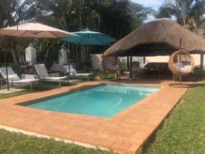 Ezulwini Guest House - Queen Room with Balcony for 2 guests in Ballito