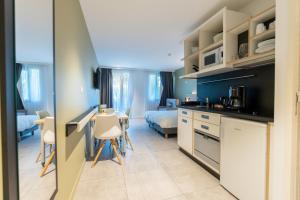 Appart'hotels Kyriad Residence Cabries - Plan de Campagne : photos des chambres