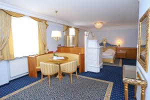 Exclusive Dreibettzimmer