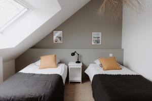 Maisons de vacances Maison cosy avec Spa privatif et piscine chauffee pres Vitre et Rennes : photos des chambres