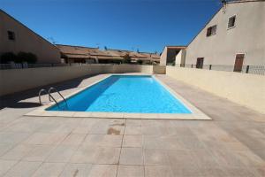 Villas Maison de vacances, 4 a 5 couchages, cuisine sejour climatise dans residence avec piscine, les Jardins de Portiragnes, 500m de la mer, LRJP31 : photos des chambres