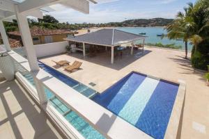 Mansão Pé na Areia da Ferradura Por Luxury Rentals