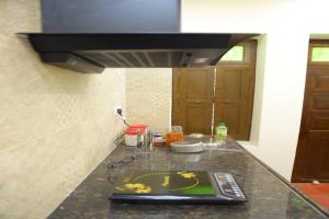 Heritage home with 2 bed2 bath with kitchen in a residential neighborhood.