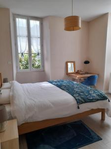 Appartements A la fontaine Saint-Blaise : photos des chambres