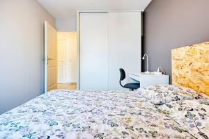 Appartements GROGNARDE - T3 climatise avec terrasse : photos des chambres