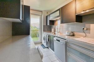 Appartements GROGNARDE - T3 climatise avec terrasse : photos des chambres