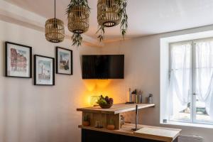 Appartements L'Odyssee - parking prive - centre ville : photos des chambres