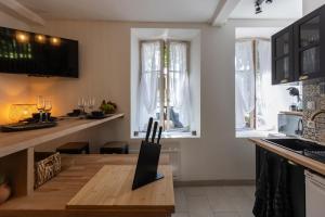 Appartements L'Odyssee - parking prive - centre ville : photos des chambres