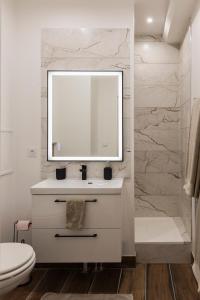 Appartements L'Odyssee - parking prive - centre ville : photos des chambres