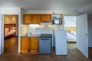 Appart'hotels SUNWEB Chalets de Bois Mean : photos des chambres