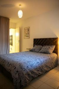 Appartements Joli Appart / Parking / CLIM / WIFI : photos des chambres