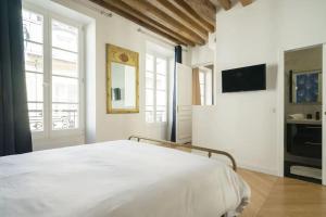 Appartements Typical Parisian Flat#3Bedrooms#Opera#Louvre : photos des chambres