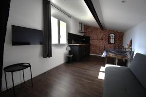 Appartements Studio industriel a 50 m de la plage et du port : photos des chambres