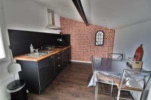 Appartements Studio industriel a 50 m de la plage et du port : photos des chambres