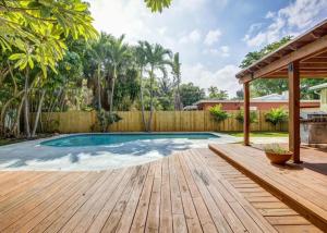Tranquil Poolside Bliss Pergola Deck Turf Yard
