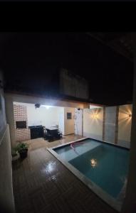 Casa com piscina e praia logo ali