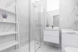 Stylish Apartment Przedpole with Balcony & Parking by Noclegi Renters