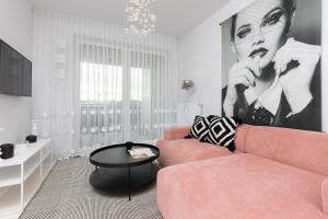 Stylish Apartment Przedpole with Balcony & Parking by Noclegi Renters