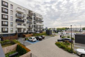 Stylish Apartment Przedpole with Balcony & Parking by Renters