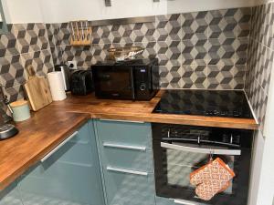 Appartements Loft 3 pieces sur jardin - 15 minutes de Paris avec parking : photos des chambres