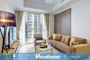 Vacationer l Luxe 1 Bedroom l Downtown Dubai l Pool Access, Free Wi-Fi & Parking
