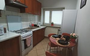 Apartament WIŚNIOWY Krakowskie Przedmieście 26