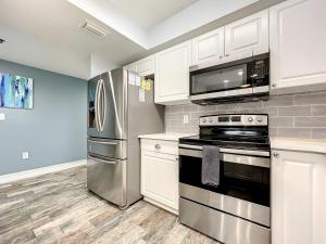 Delightful modern coastal themed 32 condo in Oceanwalk. ~OW3-303