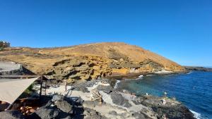 South TENERIFE 2 bedrooms with SUNNY TERRACE and AMAZING VIEWS to TEIDE and POOL