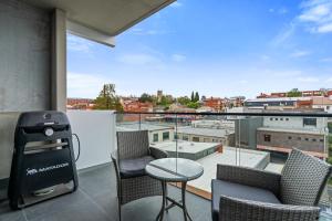 Sleek City Pad with a Garden Rooftop