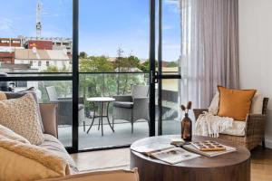 Sleek City Pad with a Garden Rooftop