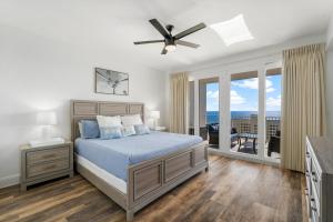 Luxurious 4 Bedroom Condo! Gulf Views! Sleeps 10 & Easy Beach Access! by Dolce Vita Getaways PCB