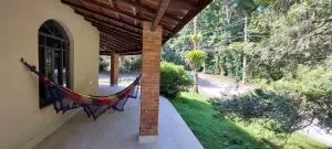 Refúgio com cachoeira e praia - Natividade da Serra