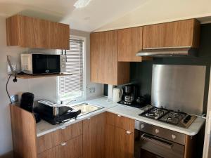 Campings JP - L'Eleganzia 2 ch, clim reversible, Confort et Elegance, : photos des chambres