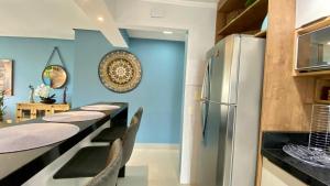 PÉ NA AREIA - SOL E MAR ENSEADA