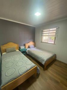 Cabaña Cunco Los Alamos a 300 metros del Centro