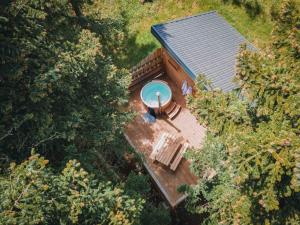 B&B / Chambres d'hotes Cabane Chalet avec spa privatif : photos des chambres