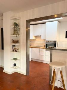 Appartement à pied du centre avec place de parking